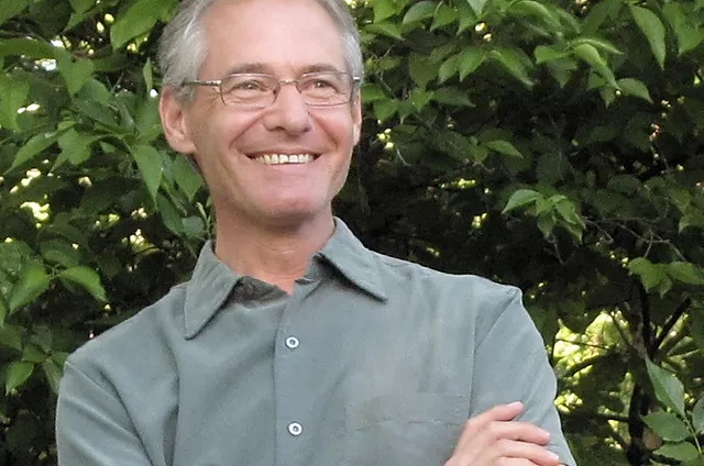 Headshot of John Zola