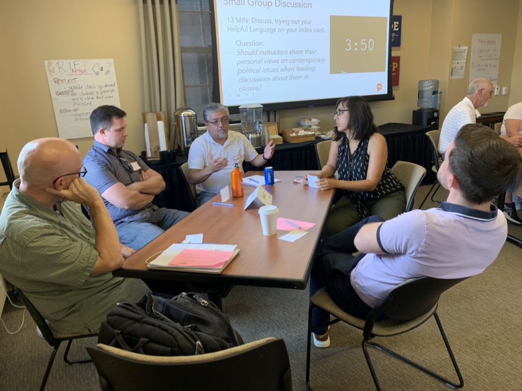 5 educators participate in a small group discussion